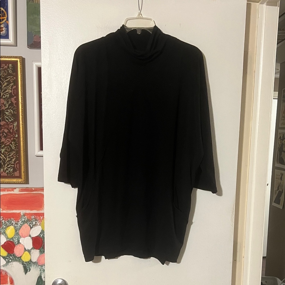 Matthildur M X black turtleneck dress. Long sleeve. Pockets